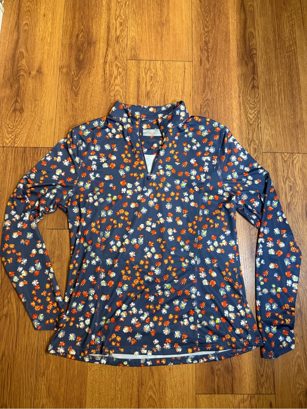 Callaway Navy Floral Long Sleeve Golf Jersey with White and Orange Flowers
